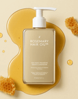 Rosemary Hair Oil Co. hair oil bottle with honeycomb and honey on a beige background. Nourishing hair conditioner designed to reduce breakage and improve manageability