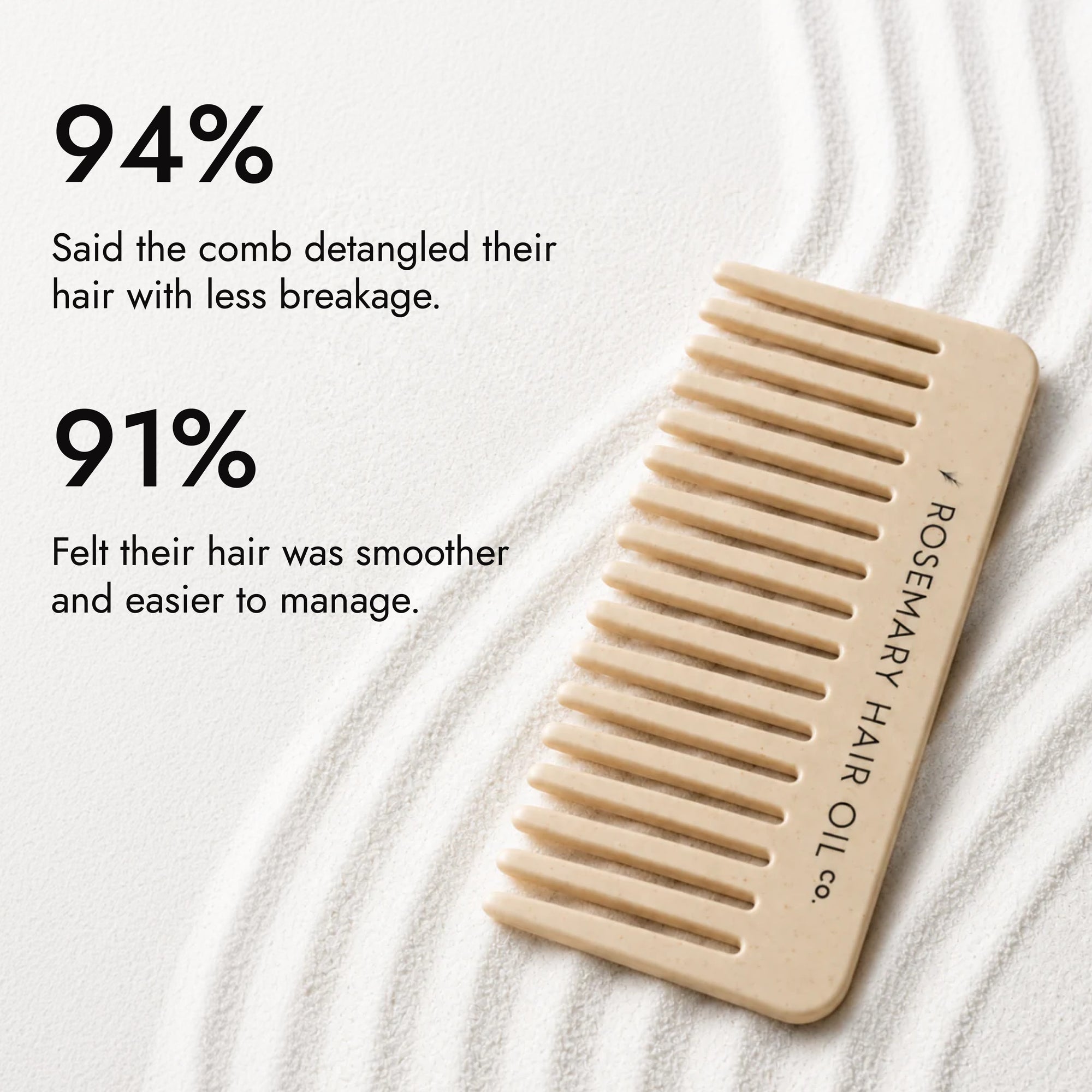 Beige comb with 'Rosemary Hair Oil Co.' branding on a beige background, wide tooth flat comb
